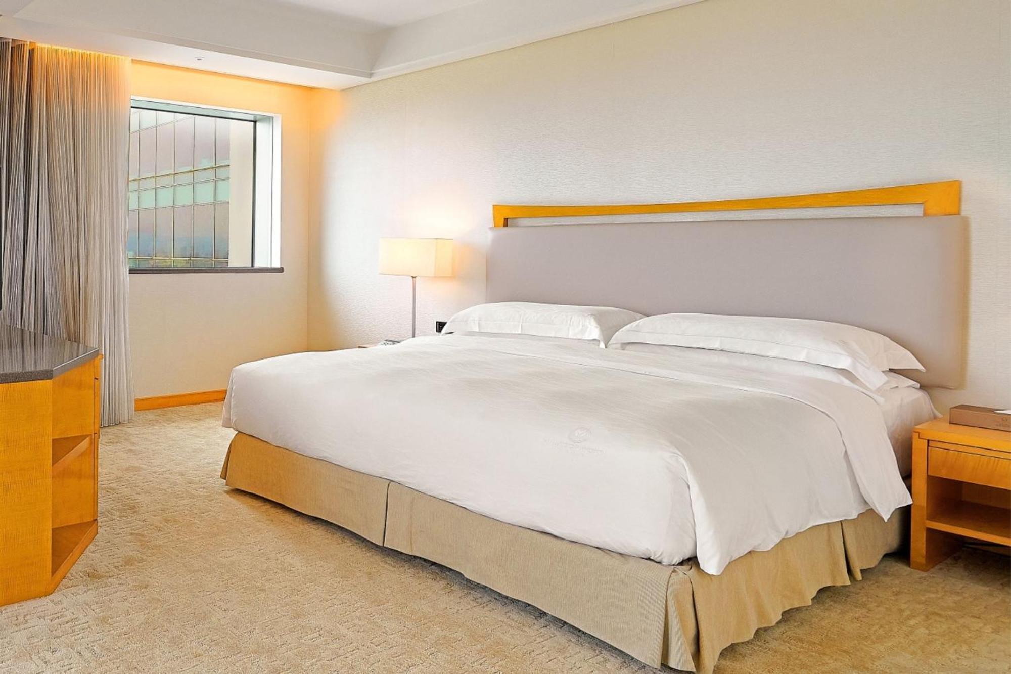 Windsor Hotel Taichung Quarto foto A bedroom at the hotel