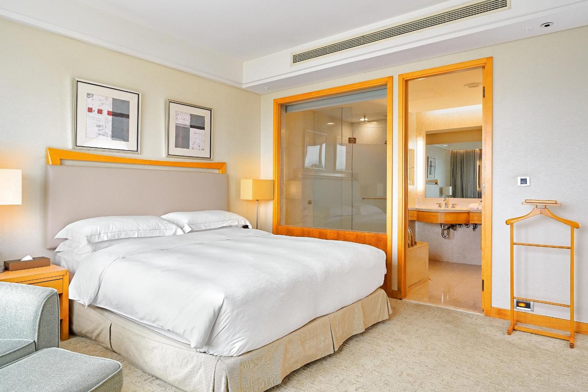Windsor Hotel Taichung Quarto foto A bedroom at the hotel
